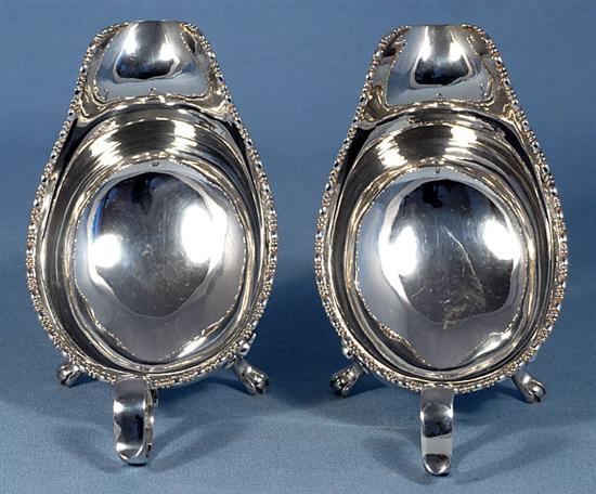 A pair of 1930s silver sauceboats, Length 7”/178mm Width 3 ¾”/95mm Height 3 ¾”/98mm, Combined Weight: 13.3oz/375grms